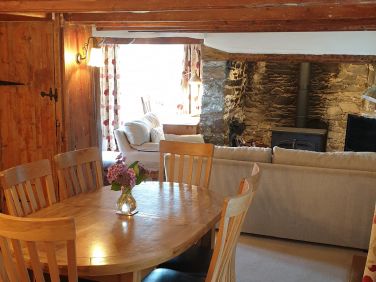 The dining table normally seats 6 people and is able to be extended to fit 8 people if needed.