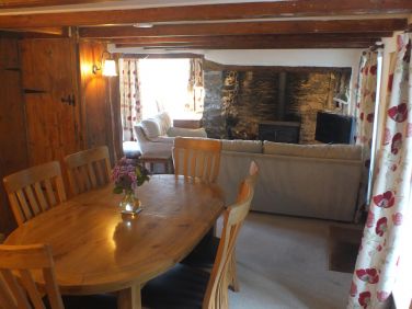 The dining table normally seats 6 people and is able to be extended to fit 8 people if needed.