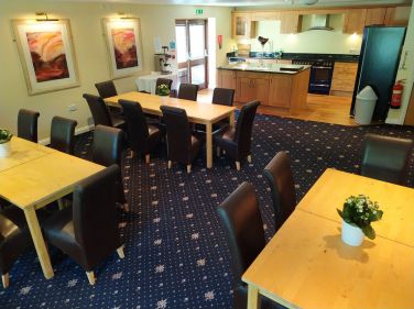 Fully equipped Kitchen/ Diner with ample of seating, looks out over the gardens and lawns