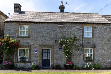 Croft View Cottage, Foolow. Parking is on this roadside outside the cottage