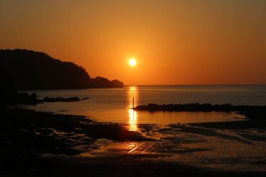 Combe Martin sunsets are the best. The sun sets in the bay mid summer