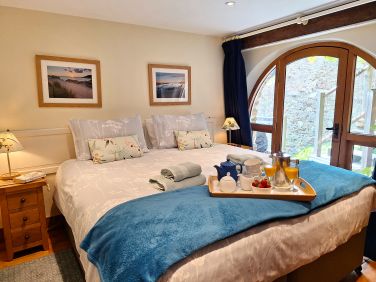 Super-king bedroom (can be a twin room) with access to the garden