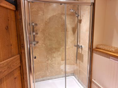 Double size walk in shower with rainfall head