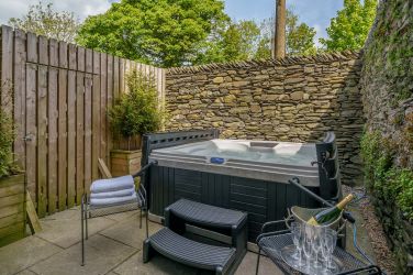 Number One, 7 seat hot tub in the rear courtyard.