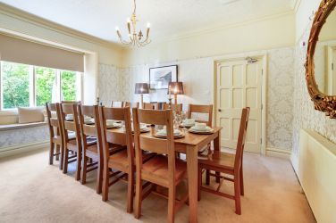 White Moss dining room seats 12.