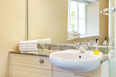 White Moss family bathroom detail.