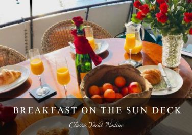 Enjoy Breakfast and Champagne like royalty on deck