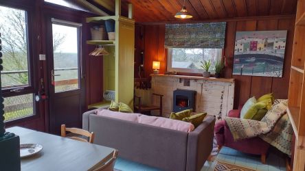 Coat cupboard with hanging space, hooks for dog towels, and shoe storage