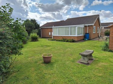Back of garden looking towards conservatory