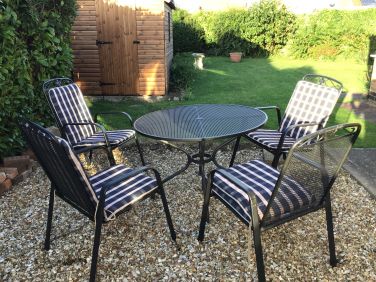 Outside eating - table and chairs with cushions