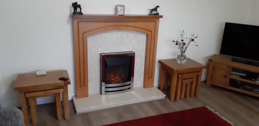 Fireplace with living flame electric fire