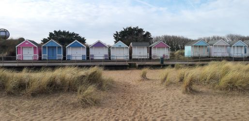 Beach huts and beach just 8-10 mins easy walk from Lavender Cottage