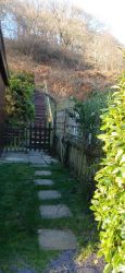 Steps to the picnic bench and fire pit