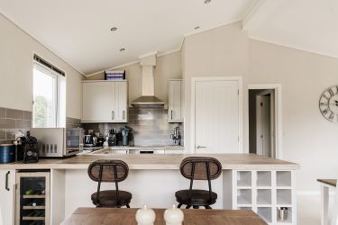 Kitchen with wine rack and wine fridge