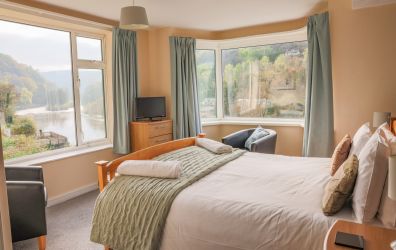 Twin aspect views of the River from the bedrooms at Wye Rapids House Symonds Yat www.bhhl.co.uk