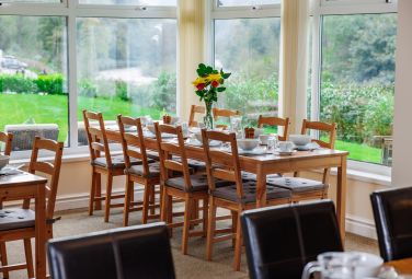 Large dining space with the spectacular River Wye backdrop Wye Rapids House    www.bhhl.co.uk