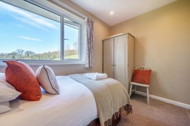 Orrest Head Cottage bedroom 2 a cosy single with amazing views over the fields.