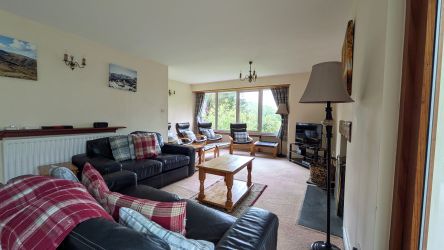 Main lounge with a fireplace
