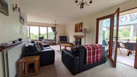 Main lounge with a fireplace