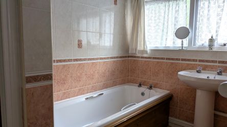 Downstairs bathroom with a shower