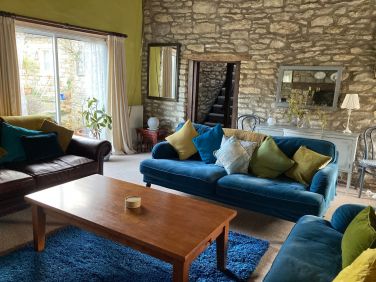 Three large comfy sofas in the lounge.