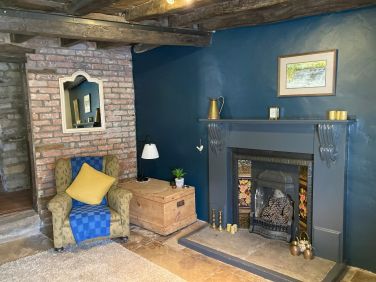 The snug provides a second lounge for guests.