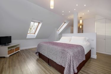 Master bedroom upstairs at The Capercaillie at airhouses