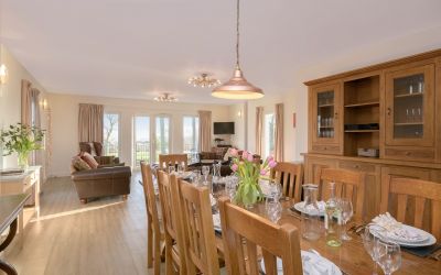The Oak dining table for ten at The Capercaillie airhouses