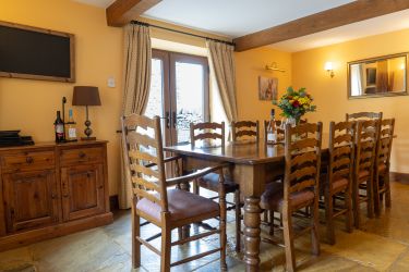 Dining Room seats 10 Plus 2 extra dining chairs.