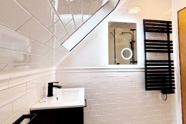 Master bedroom ensuite. Heated towel rail, heated, illuminated mirror with bluetooth speaker.