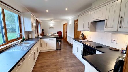 Open plan kitchen and dining area.