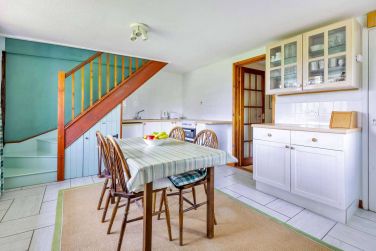 Kitchen diner with stairs to lounge
