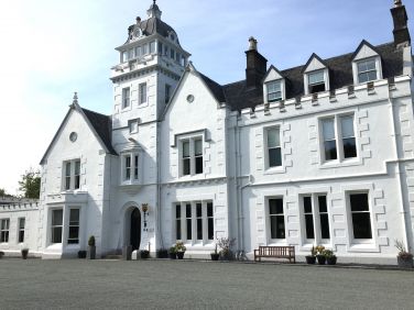 Historic Skeabost House Hotel - a short riverside walk from Crepigill Cottage for coffee or a meal