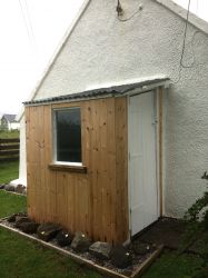 Shed and labelled collection of Skye rocks