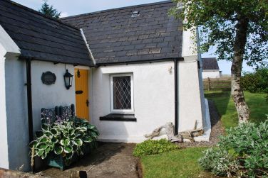 Garden surrounds the cottage