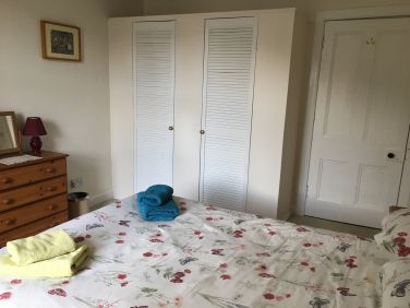 Bedroom with cupboard space