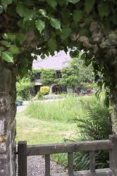 Looking through the garden gate to the cottage