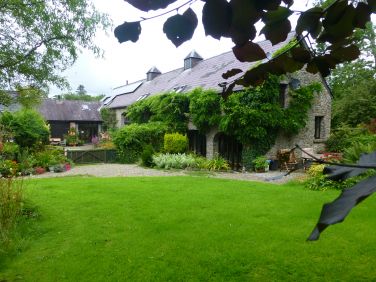Looking down the garden at The Coach house and Ty Cefn Tregib.