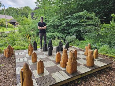 Play a game of chess in the garden using these hand carved giant chess pieces