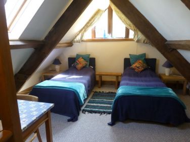 Attic bedroom twin beds can be made into a super king sized double