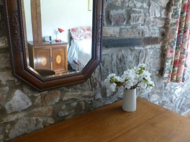 Double bedroom detail. There are always fresh flowers