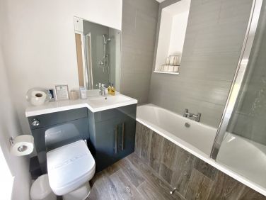 Upstairs bathroom, with lovely deep bath and power shower over