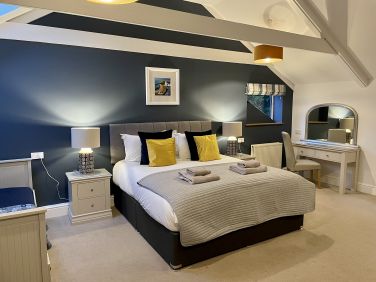 Luxurious master bedroom with 6' Superking Bed