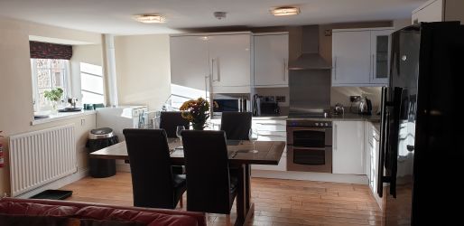 Kitchen and large dining area.