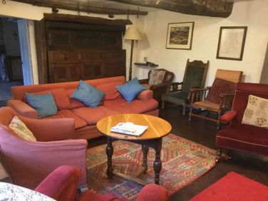 Sitting room with court cupboard