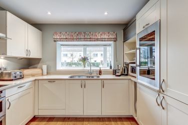 Well stocked kitchen with wine fridge