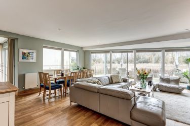 Lovely bright open plan living with log burner and air conditioning