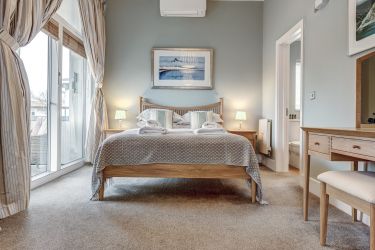 First floor master bedroom with shower en-suite and air conditioning