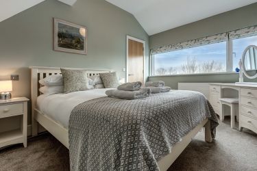 Second floor king bedroom with en-suite and air conditioning