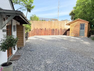New Extended car park and shed